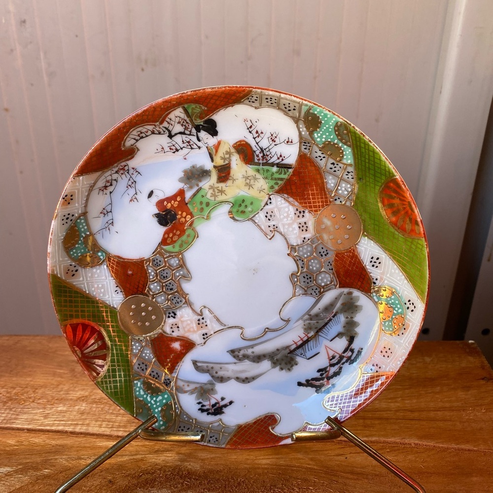 Vintage Colorful Decorative Japanese Kutani plate with old tripod .